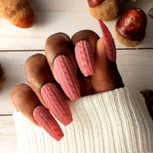 Load image into Gallery viewer, Soft pink sweater designs give a fun textured look to these press-on nails. Long ballerina shape is featured, however you can chose from a variety of shapes and lengths.

